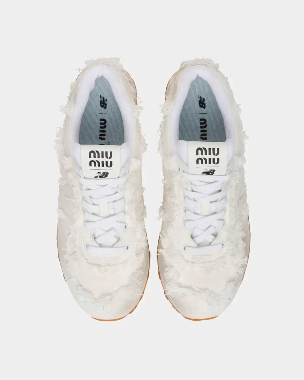 574 SL Low Baskets – White Edition